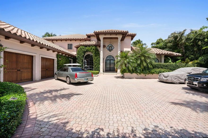 An outstanding waterfront custom home. Most gracious and appealing feeling as you enter this elegant, most liveable floor plan featuring superior quality throughout.  Stylish master bedroom and new state-of-the-art bath.  New large pool and spa alongside the outdoor kitchen.  Hurricane impact glass, large gated courtyard driveway.  Too much more to describe, a must-see!!!