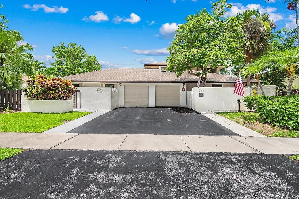 Photo of 378 SW 28th Avenue, Delray Beach, FL 33445 (MLS # B26038422)