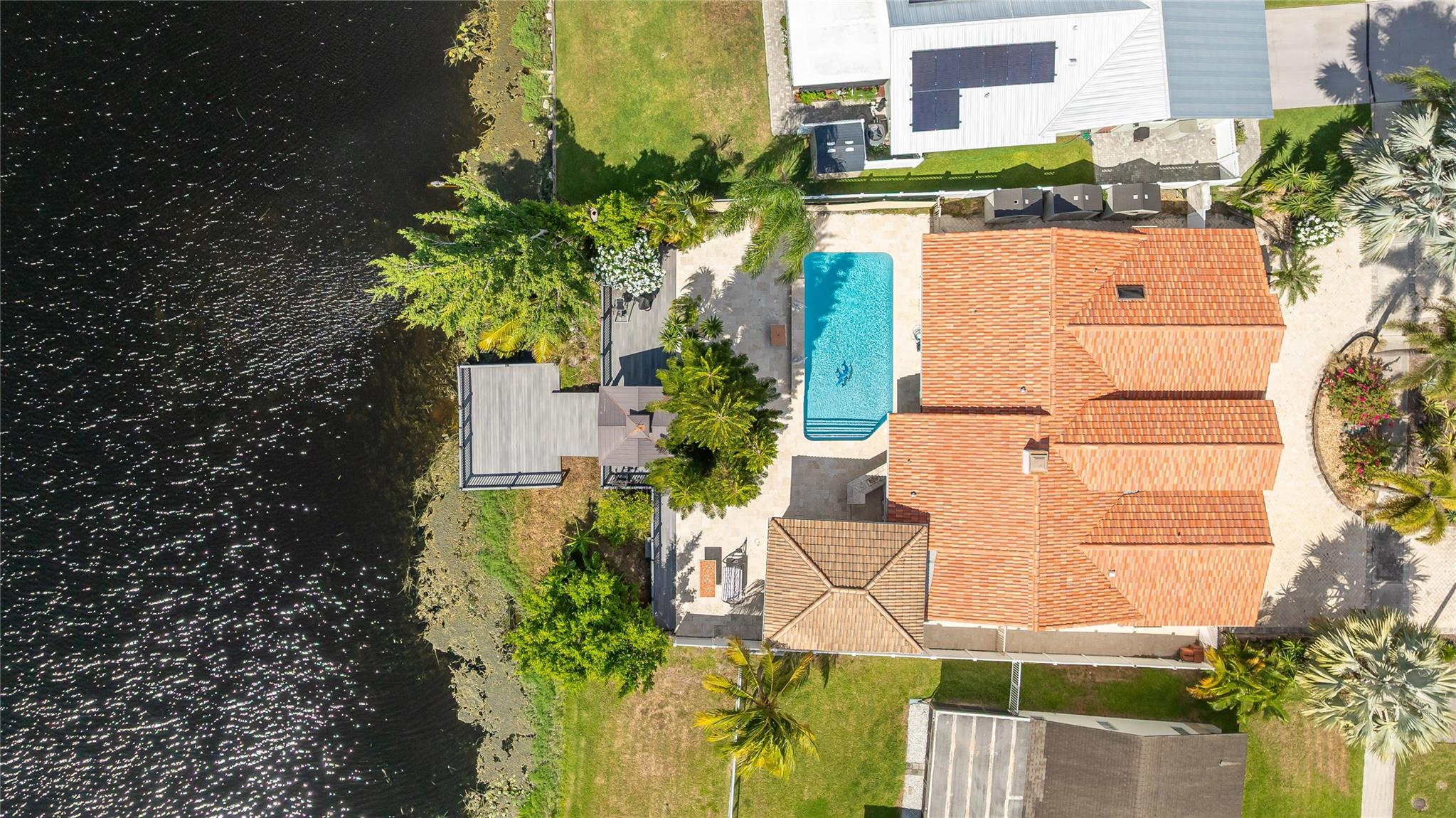 Stunning, Fully Upgraded 3-Bedroom Home with Lake View & Saltwater Pool, Schedule a showing today for this beautifully updated 3/2 single-family home offering 2,720 sq ft under air. Featuring a new 2023 roof, impact windows and top-of-the-line finishes throughout, this home includes: new pool pump & heater, spacious deck & patio area, custom gazebo, and breathtaking lake views. The upgraded kitchen includes premium appliances, and the home is equipped with a water filtration system plus a spring water drinking system with pH balancing. Additional features include a new microwave, washer/dryer, exterior surveillance system. No HOA or rental restrictions. perfect for Airbnb. Prime location, easy access to Sawgrass Expressway, Turnpike, and I-95, only 5.2 miles from beautiful Deerfield Beach.