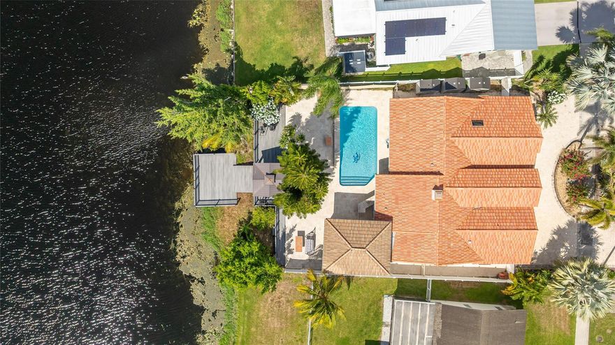Stunning, Fully Upgraded 3-Bedroom Home with Lake View & Saltwater Pool, Schedule a showing today for this beautifully updated 3/2 single-family home offering 2,720 sq ft under air. Featuring a new 2023 roof, impact windows and top-of-the-line finishes throughout, this home includes: new pool pump & heater, spacious deck & patio area, custom gazebo, and breathtaking lake views. The upgraded kitchen includes premium appliances, and the home is equipped with a water filtration system plus a spring water drinking system with pH balancing. Additional features include a new microwave, washer/dryer, exterior surveillance system. No HOA or rental restrictions. perfect for Airbnb. Prime location, easy access to Sawgrass Expressway, Turnpike, and I-95, only 5.2 miles from beautiful Deerfield Beach.