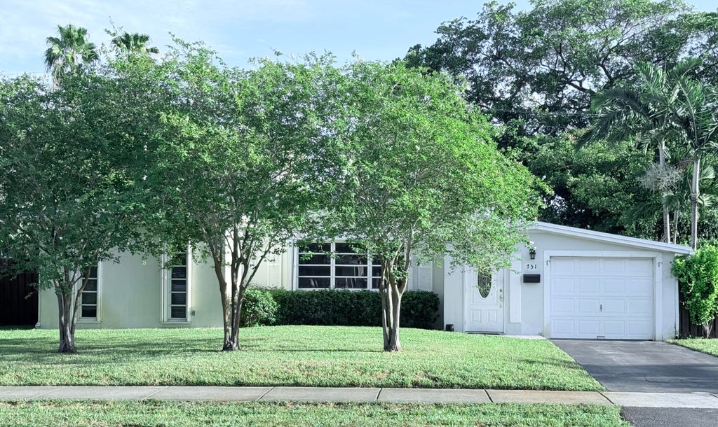 Photo of 751 NE 61ST Street, Oakland Park, FL 33334 (MLS # B26071370)