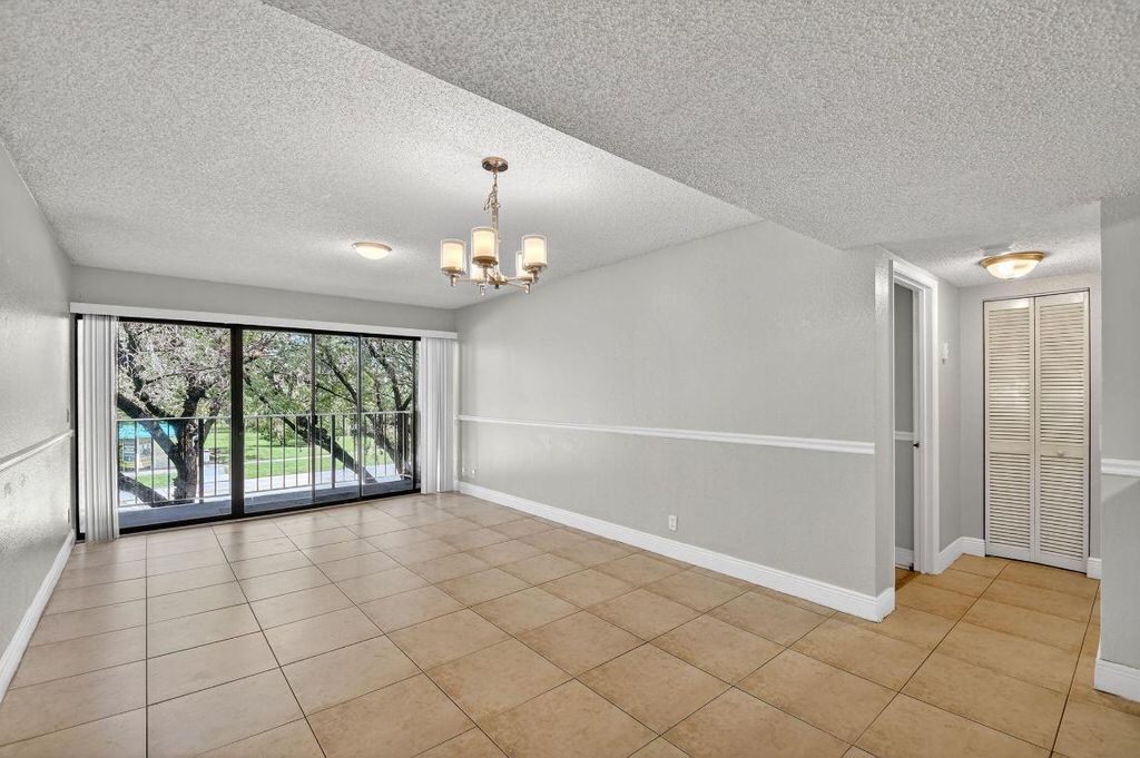Photo of 1400 Windorah Way #G, West Palm Beach, FL 33411 (MLS # R11146857)