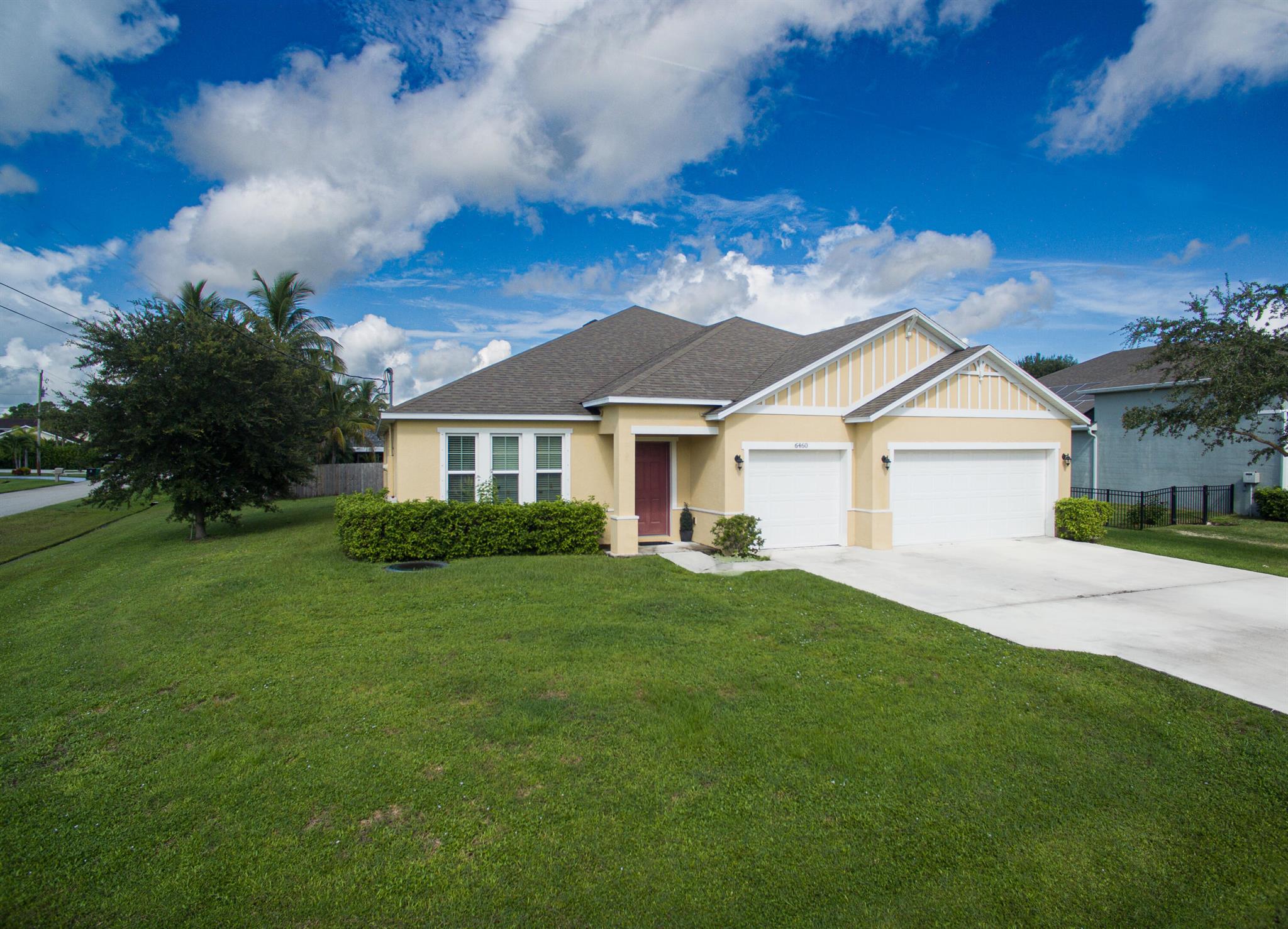 Lots of room to spread out in this fabulous 5 bedroom 3 full bath home with a 3 car garage. Large kitchen with island sink and bar opens to the great room and dining room. There is also a dining area in the kitchen. Den is currently being used as a 5th bedroom. Large walk-in closet in master bedroom. Master bath features double sinks, soaker tub, and separate shower. Smart lighting. Designer ceiling fan in family room. Solid CBS construction. Corner lot with room for a pool. No HOA in this highly desirable Torino area of NW Port St Lucie. Carpet in bedrooms needs replacing and seller is offering a $9000 credit so you can choose your own flooring.