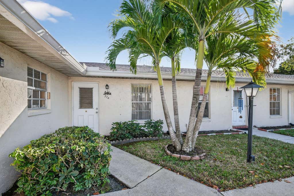 Photo of 374 Bennington Lane, Lake Worth, FL 33467 (MLS # R11164066)