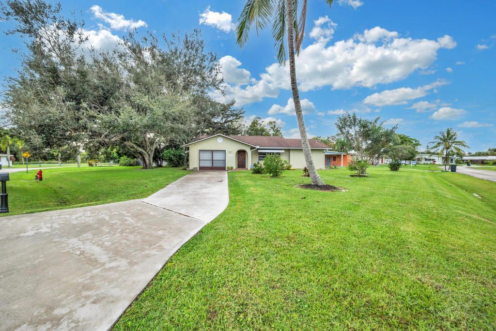 Photo of 203 SE Camino Street, Port St Lucie, FL 34952 (MLS # R11097774)