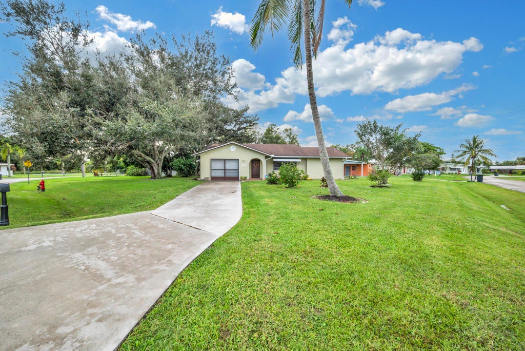Photo of 203 SE Camino Street, Port Saint Lucie, FL 34952 (MLS # R11097774)