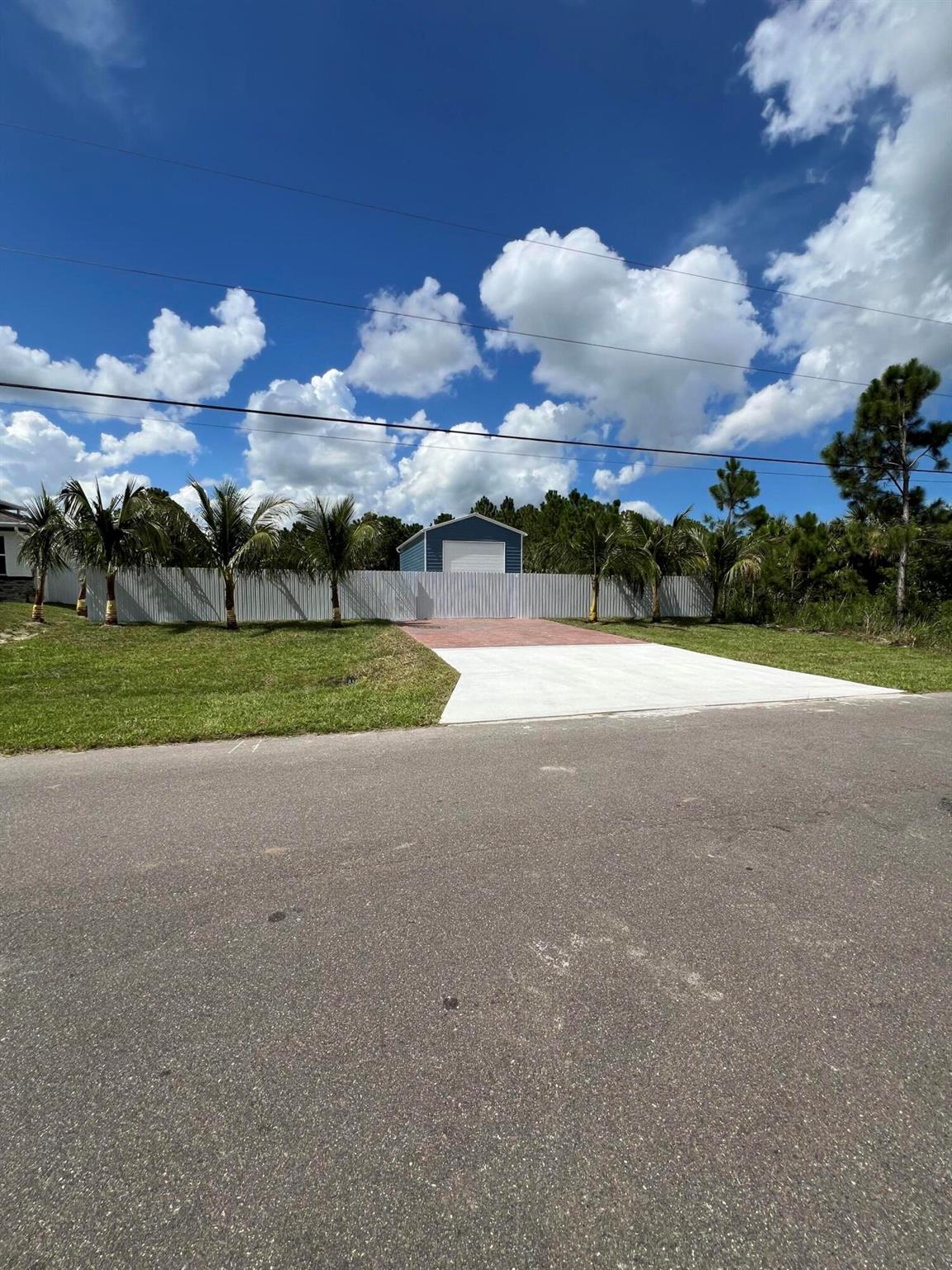 Beautiful property with half an acre of fully fenced land. Newly built, only 7 months old, and comes with the builder's warranties. With space for trucks, RVs, boats, and animals. Mostly paved and has a metal carport for parking or working. Very private and with few neighbors. Owner occupied. Make an appointment via message with the listing agent.