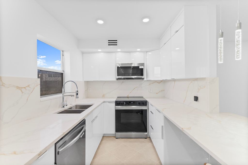 Photo of 160 Brittany, Delray Beach, FL 33446 (MLS # B26003473)