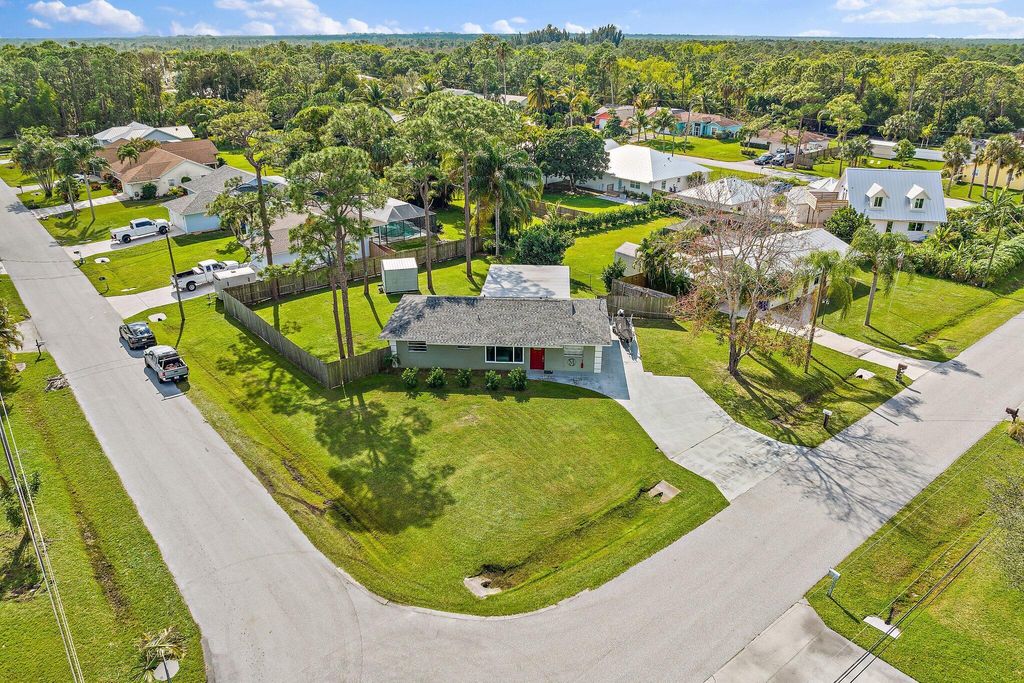 Photo of 5854 SE Orange Blossom Trail, Hobe Sound, FL 33455 (MLS # R10908571)