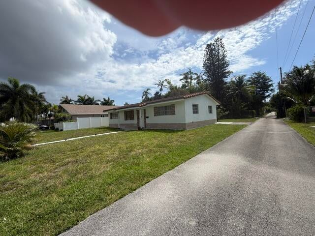Photo of 210 NE 5th Avenue, Dania Beach, FL 33004 (MLS # B26044642)