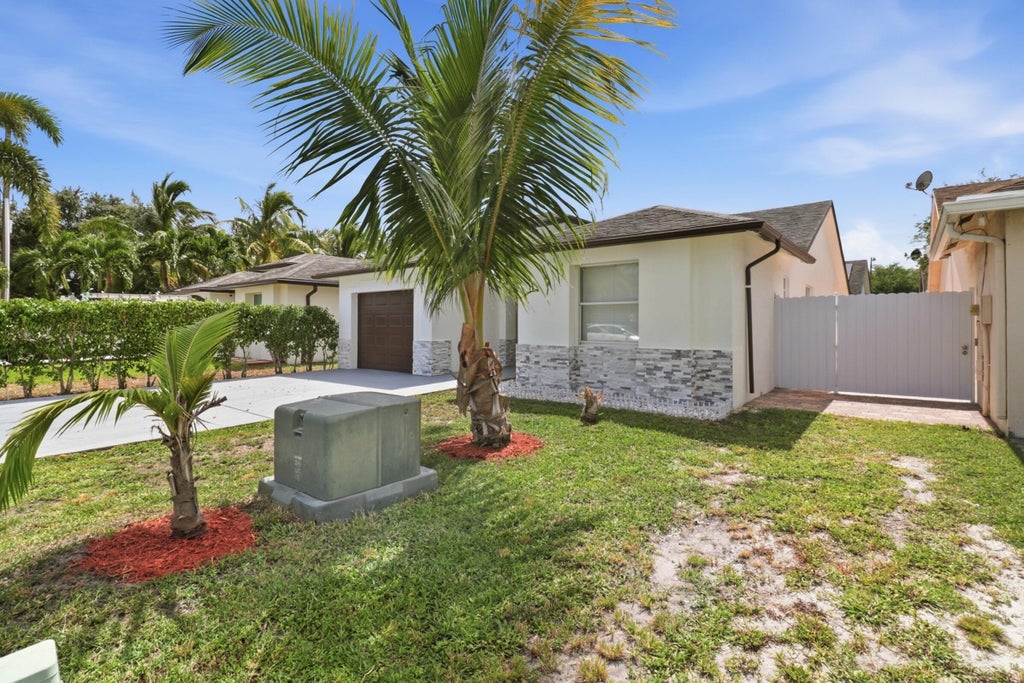 Photo of 105 Vanessa Street, Palm Springs, FL 33461 (MLS # B26063905)