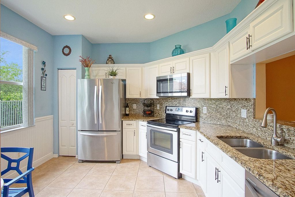 Photo of 9782 SW Glenbrook Drive, Port Saint Lucie, FL 34987 (MLS # R10980571)