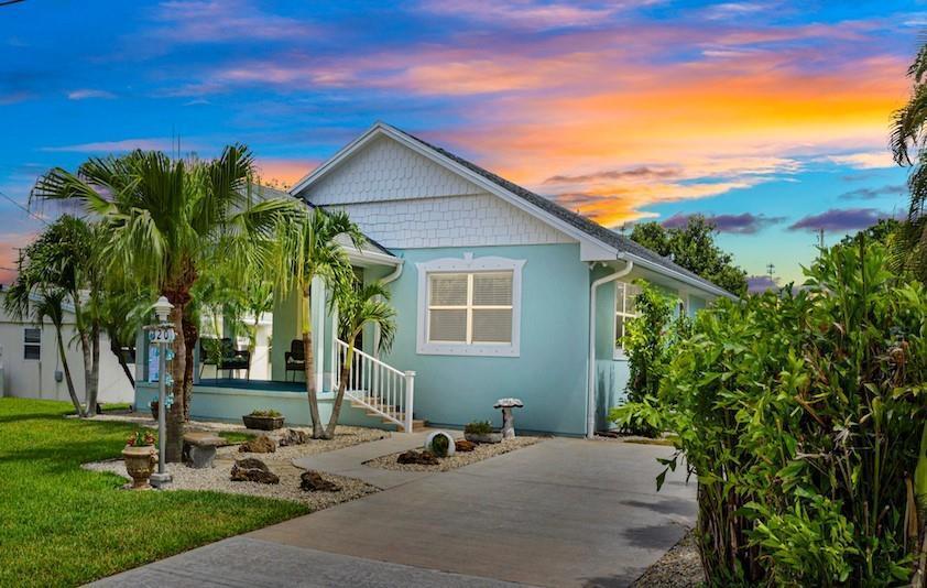 Welcome to 320 14th Place a charming home located in the sought-after community of Rock Ridge in Vero Beach This delightful property offers a perfect opportunity for those seeking a Winter Getaway. The well-appointed kitchen is a haven for any culinary enthusiast featuring sleek countertops modern appliances and ample cabinet space Enjoy the screened back porch where you can savor your morning coffee while basking in the tranquility of your surroundings. The location is truly ideal: near pristine area beaches with easy access to sun sand and surf For those who enjoy shopping and dining Miracle Mile is just a short distance away, offering an array of shops, boutiques, and restaurants This home exudes old Florida charm making it the perfect Seasonal Escape!