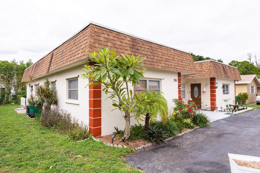 Fantastic investor opportunity! Spacious duplex offering two 2BR/2BA units, each with 1,200 sq ft of living space and tile floors throughout. Both units include their own washer and dryer. Roof replaced in 2020. South side water heater only 2 years old; north side A/C just a few years old. Both units have storm shutters. NO HOA RESTRICTIONS!!!! Ideal for strong rental demand, long-term appreciation, or a live-in-one, rent-the-other strategy. Located in a high-demand area of Tamarac near parks, shopping, dining, and major highways. Excellent income-producing potential with solid upside.