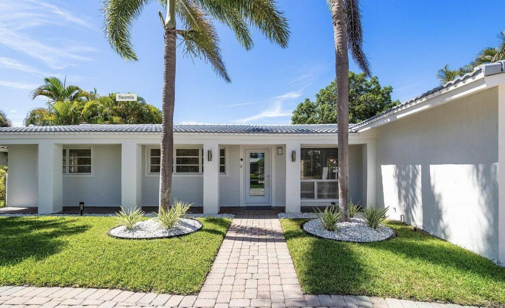 Photo of 740 NE 69th Street, Boca Raton, FL 33487 (MLS # B26001581)