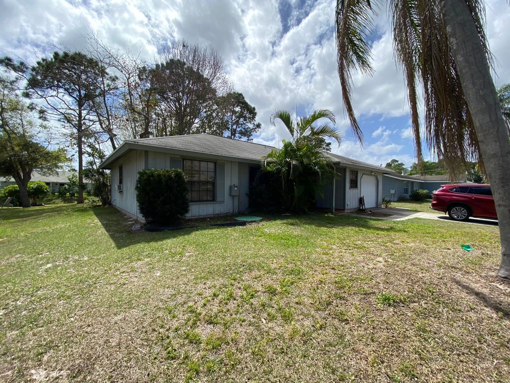Photo of 966 SE Atlantus Avenue Ave, Port St Lucie, FL 34983 (MLS # R10782913)