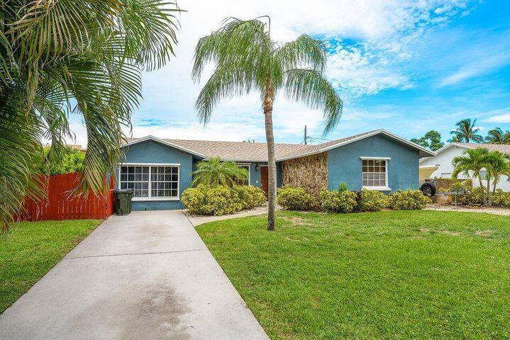 Fantastic opportunity awaits in the highly desirable community of Tropic Palms.. This fully fenced in pool home is situated on an over-sized corner lot.. New roof was put on in 2021.. Space on the side of the house for you to dock your boat or RV.. While officially listed as a 3 bed & 2 bath home, there is an additional living space currently used as a 4th bedroom, as well as a bonus storage space in the back that is fully enclosed.. This home is conveniently located to all of East Delray, including Atlantic Ave, the ocean, & the intracoastal.. Also minutes away from grocery & department stores, as well as restaurants & dining.
