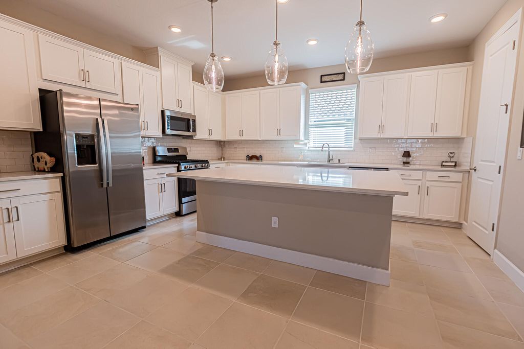 Photo of 12877 SW Ambra Street, Port Saint Lucie, FL 34987 (MLS # B26050654)