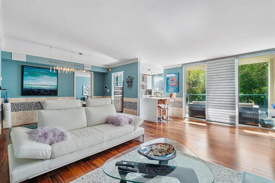 ***Vacant and Easy to Show. Next door to the Hillsboro Mile Boardwalk!
This bright and airy condo features partial views of both the Atlantic Ocean and the Intracoastal Waterway from a private balcony.
 Beautifully updated, upgrades include a modern kitchen with quartz countertops, new stainless steel appliances, wet bar, high-end speaker system, built-in shelves, built-in walk-in closets, and engineered wood floor in bedrooms and living areas. Enjoy Port de Mer's two idyllic pool settings, one overlooking the Intracoastal and the other ocean side. Stroll to your private beach or walk the Hillsboro Mile boardwalk to the Deerfield Beach Pier.   Welcome to Paradise!