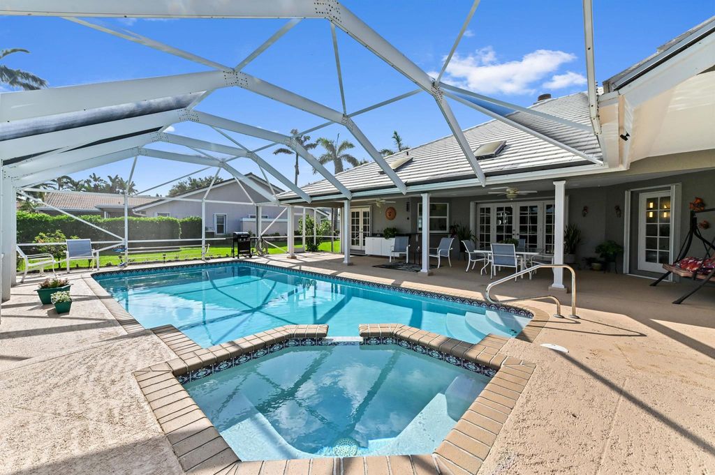 Photo of 4645 Lotus Way, Boynton Beach, FL 33436 (MLS # R11106427)
