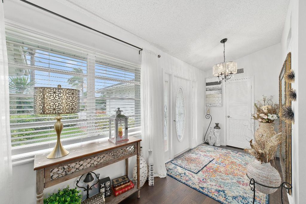 Photo of 10814 Greentrail Drive S, Boynton Beach, FL 33436 (MLS # R11050412)