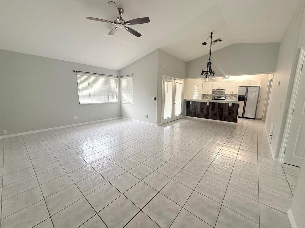 Photo of 1355 SW Granville Avenue, Port Saint Lucie, FL 34953 (MLS # R11073830)