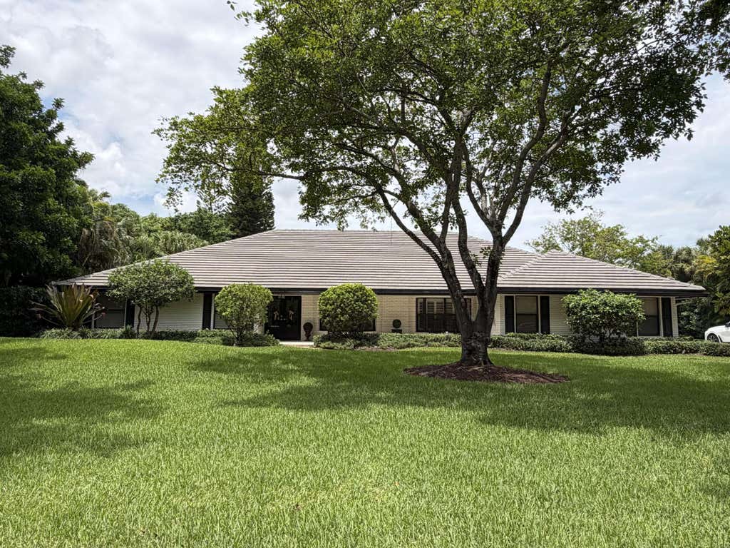Photo of 7321 E CYPRESSHEAD Drive, Pompano Beach, FL 33067 (MLS # B26063221)