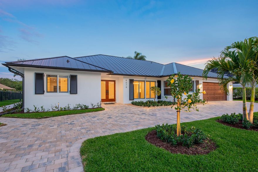 Welcome to your 100 foot waterfront island estate, fenced, new dock, ocean access, no fixed bridges, large boat access in a deed restricted community. This renovated elegant transitional home design is coastal living. Custom kitchen, bar & spacious open floor plan. Engineered wood floors & solid doors, crown molding and trim. 3-bed 3-baths & en-suite + office/4th bedroom, custom closets. Standing seam metal roof, Icynene insulation, impact windows, plantation shutters inside. Refinished pool & patio with stained wood ceilings, roll down screens, circular driveway, new landscaping & lighting front & rear. Indoor & outdoor living at it's finest. Private marina, boat ramp, tennis courts, dog park & clubhouse in the Soundings Yacht & Tennis Club.