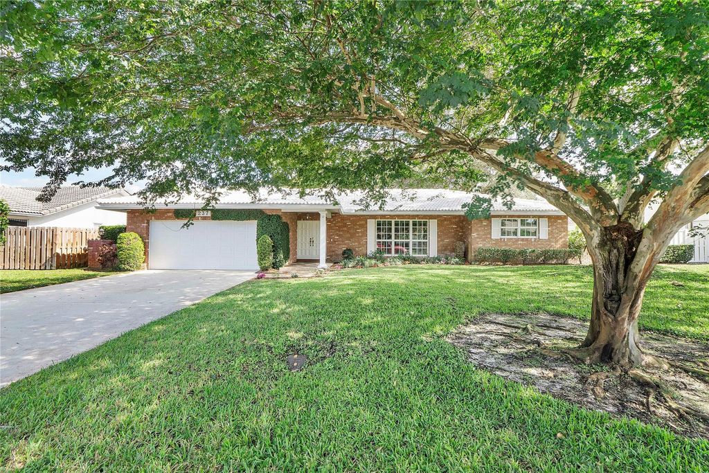 Photo of 237 NW 92nd Ave, Coral Springs, FL 33071 (MLS # F10535910)