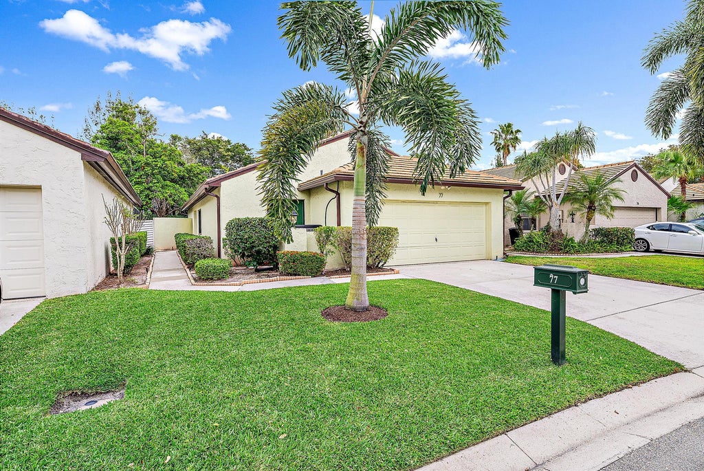 Photo of 77 Ironwood Way N, Palm Beach Gardens, FL 33418 (MLS # R10962495)
