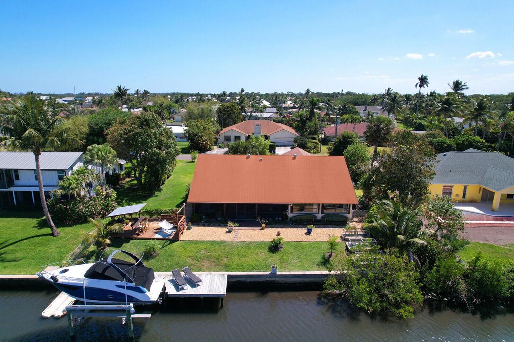 Photo of 8337 SE Coconut Street, Hobe Sound, FL 33455 (MLS # R11072818)