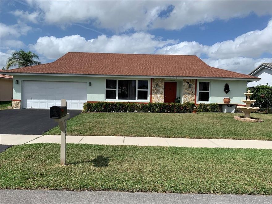 BEAUTIFUL HOME LOCATED IN SAUGHT AFTER AREA OF MARGATE.  THE OPEN KITCHEN IS UPDATED WITH GRANIT COUNTER TOPS AND NEW WOOD CABINETS.  THE BATHROOMS ARE UPDATED WITH NEW WOOD CABINETRY, GRANIT COUNTER TOPS, AND NEW TILE.  ALL IMPACT WINDDOWS. LIVINGROOM AND DININGROOM CHANDLIER DO NOT STAY.