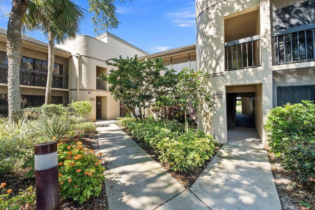 Photo of 9450 Meadowood Drive #203, Fort Pierce, FL 34951 (MLS # R10976340)