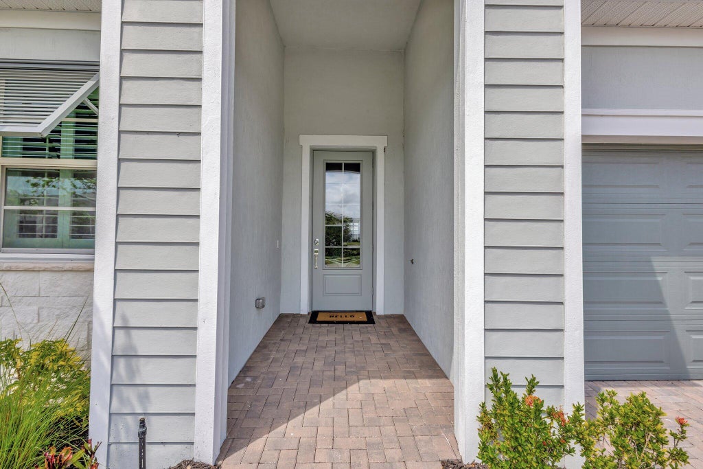 Photo of 14245 SW Britton Avenue, Port Saint Lucie, FL 34987 (MLS # R11086597)