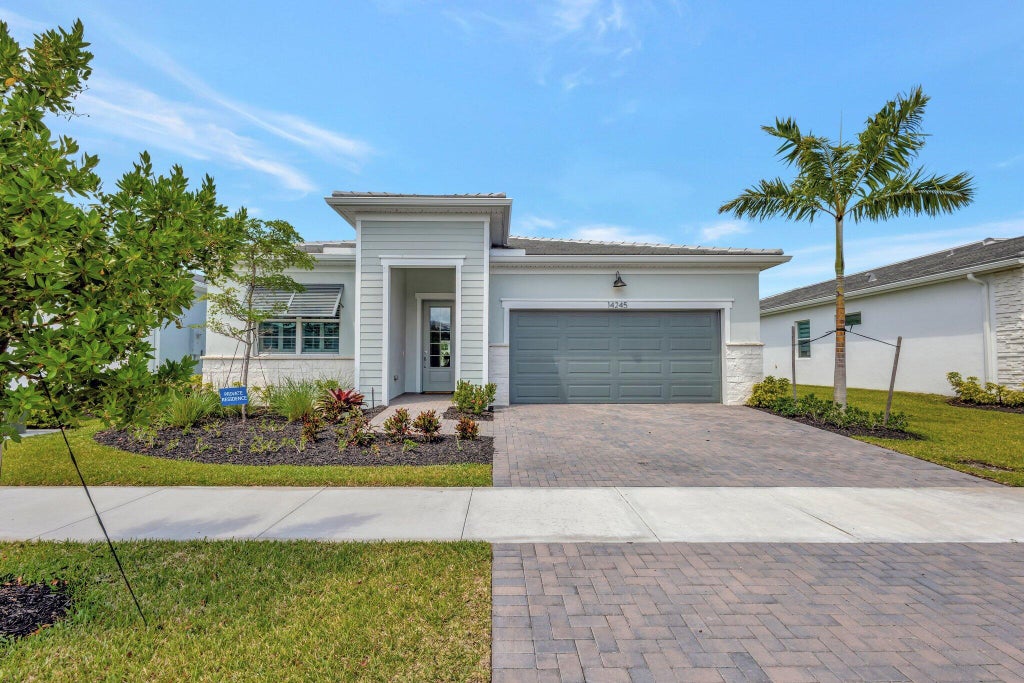 Photo of 14245 SW Britton Avenue, Port Saint Lucie, FL 34987 (MLS # R11086597)
