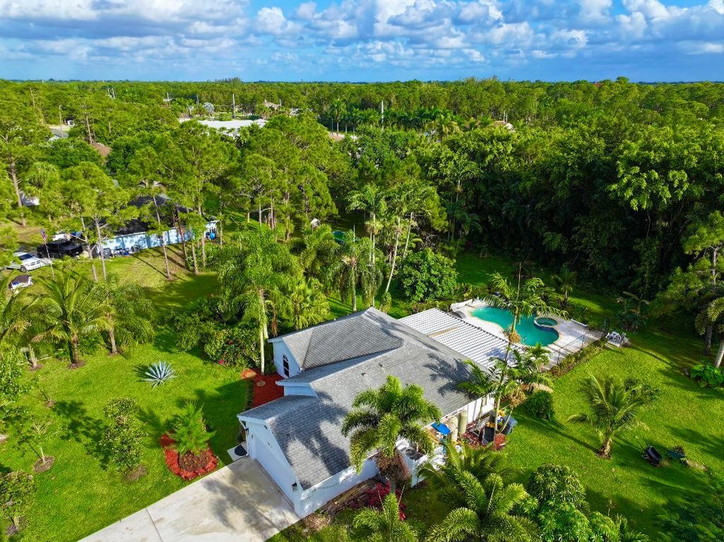 Photo of 15618 80th Lane N, Loxahatchee, FL 33470 (MLS # R10955429)