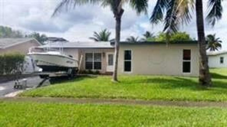 Great Location. Nicely updated home on waterfront canal lot. Home Features Spacious Open Floor Plan With Split Bedrooms, Updated New Kitchen and Appliances, Granite Countertops, Tile and Wood Flooring Throughout, Impact Windows, Screened Patio, Large Fenced Yard. Excellent Location, Minutes to All Shopping, Restaurants, Sawgrass Mall and Interstates. Very Nice Home In great location. Tenant occupied til end of September  Showings and Occupancy available after October 1st. Shown by appointment. Please use show assist. Please see Broker Remarks.
