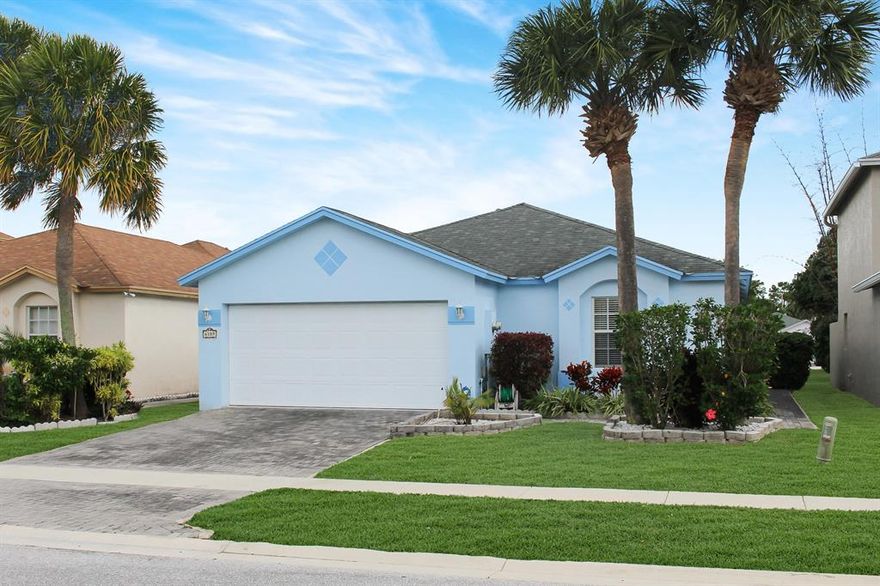 You will love this 3/2 CBS home that has been well maintained and has an ideal location minutes to everything you desire. The split design is a perfect layout with an open kitchen area to the dining area and great room. Vaulted ceilings add openness to the living areas and newer laminate floors in the bedrooms add warmth. The large master bedroom offers lots of space with a walk in closet and larger master bath with double vanity, walk in shower and whirlpool tub. There is also a covered screened patio to enjoy your backyard space. There is a 2 car garage too which is a real plus. The home is located in a manned gated community with all of the community amenities that you desire. Hurry, this one won't last.