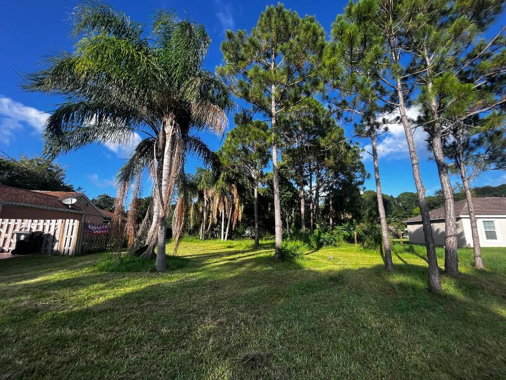 Photo of 2261 SE Monitor Street, Port Saint Lucie, FL 34952 (MLS # R11006986)