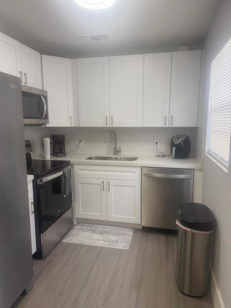 Great 2nd floor corner unit located in Century Village East a 55+ community with many amenities.  Close to house of worship and shopping. Only 3 miles from the beach. Fully renovated, new kitchen cabinets and appliances, as well as 2023 water heater. No rentals allowed.