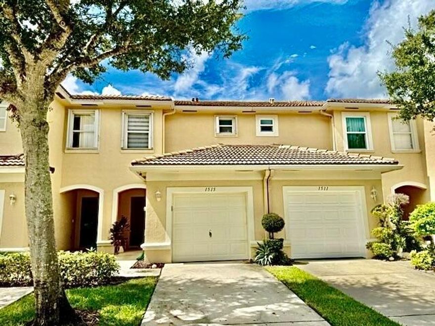 Major price reduction!! Such a beautiful, move-in ready all ages TH in Wellington. Hurricane protection. OPEN, light and bright, white kitchen with SS appliances with large countertop, great for entertaining and for bar stools. Pantry included. Coffee/liquor bar.  Gorgeous tile floors on the first floor. Half bath on the first floor for guests. Newer luxury window treatments. Screened patio with storage. Second floor loft/home office/playroom/exercise room. Guest bedroom could have private bathroom. The primary suite is bright and large. White and bright bathroom, double sinks, shower with window. Pet friendly community. Low maintenance. Short walk to pool. Easy access to all that is Wellington.
