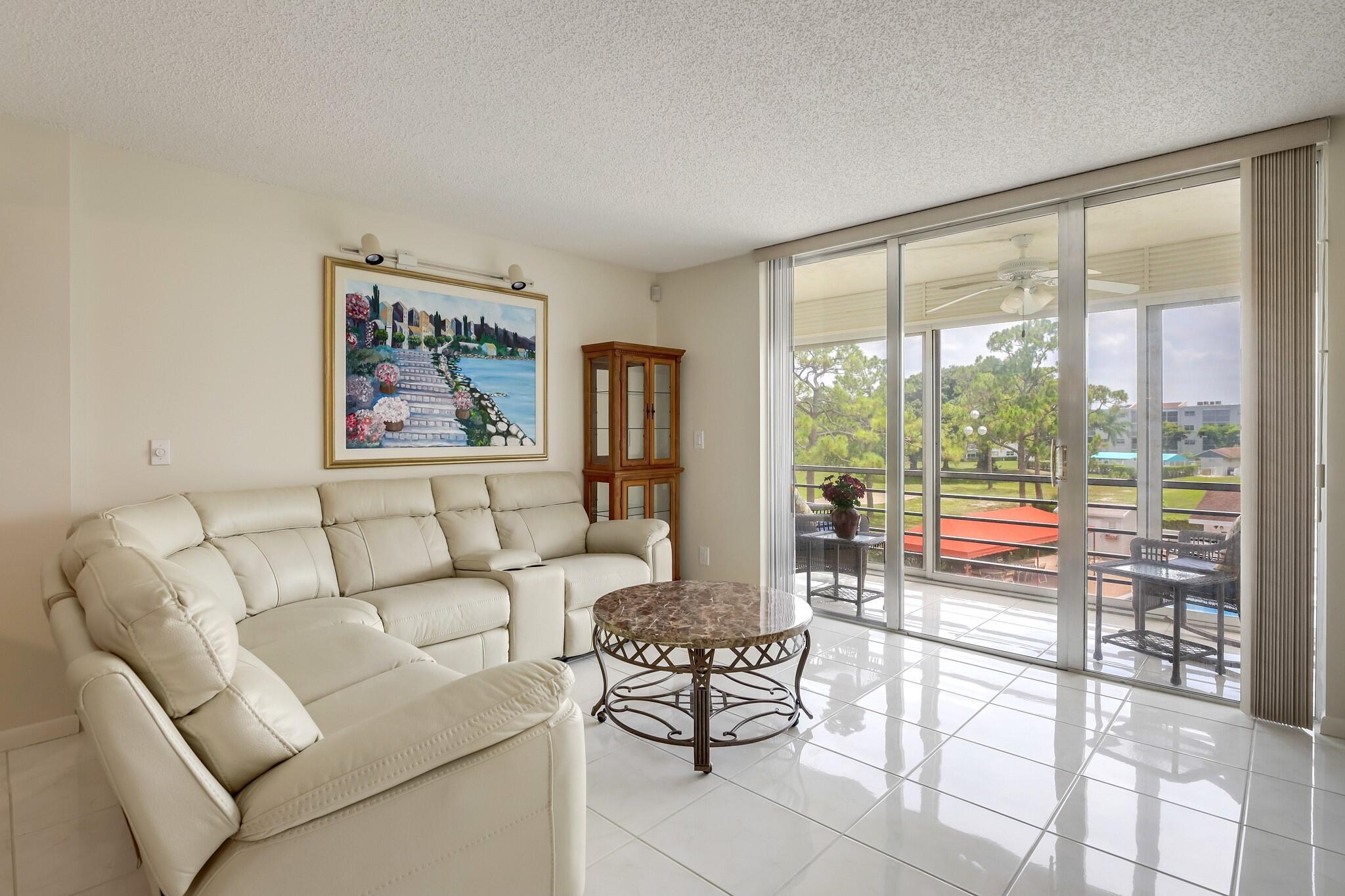 WELCOME TO THIS NATURALLY BRIGHT CONDO WITH SOUTH FACING VIEWS OF THE GOLF COURSE, POOL, LAKE & FOLIAGE. THIS CONDO HAS LARGE TILED FLOORING, SPACIOUS ROOMS & LOTS OF CLOSET SPACE. THE BALCONY HAS GLASS SLIDERS TO KEEP IN THE VIEW & KEEP OUT THE RAIN. UPDATED BATHROOMS & KITCHEN APPLIANCES & PARTIALLY FURNISHED, THIS CONDO IS A QUICK MOVE-IN. THE CARLISLE BUILDING HAS 2 ELEVATORS (UPDATED), A POOL AT THE BUILDING, & AN UPDATED ROOF (2022).THERE IS ANOTHER POOL AT THE CLUBHOUSE WITH PICKLEBALL, TENNIS, GOLF (PAY AS YOU PLAY), GYM, MEL'S BISTRO & ENTERTAINMENT, CLASSES & MORE! CONVENIENTLY LOCATED MINUTES TO THE TURNPIKE, SHOPPING, RESTAURANTS, APPROX.8 MILES TO THE BEACH. 55+AGE COMMUNITY WITH LOTS TO ENJOY.