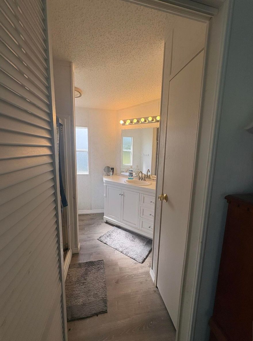 2-bedroom, 2 full bathroom mobile home priced aggressively for a quick sale. This inviting residence features a spacious layout and a large screened-in patio—perfect for relaxing or entertaining year-round. Located in a vibrant 55+ community offering resort-style amenities including a golf course, tennis courts, multiple swimming pools, three clubhouses, a theatre, café, and a wide variety of social clubs and activities. Enjoy an active lifestyle in a welcoming neighborhood with everything you need right at your fingertips.