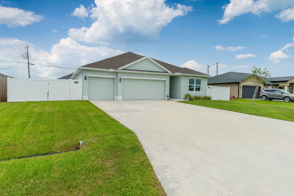 Photo of 1912 SW Fanfare Street, Port Saint Lucie, FL 34987 (MLS # B26062731)