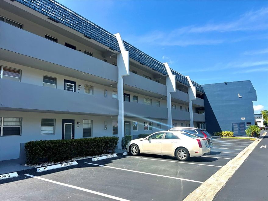 Wow! Another, Amazingly, beautiful updated,2 beds, 2bath, first floor condo. Huge Master bedroom with Large walk-in closet, guest bedroom has large wall to wall, beautifully, updated bathrooms with spacious eat in kitchen with pass-thru. Gorgeously tiled throughout. Large screened patio. Close to elevator and stairs, Well-Kept complex. Pool and clubhouse view. Steps from pool. Priced for fast sale. Will not Last!!