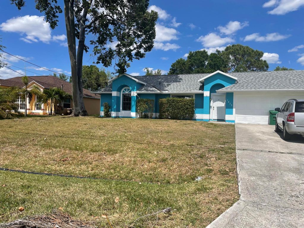 Photo of 1473 SW Algardi Lane, Port St Lucie, FL 34953 (MLS # R10892810)