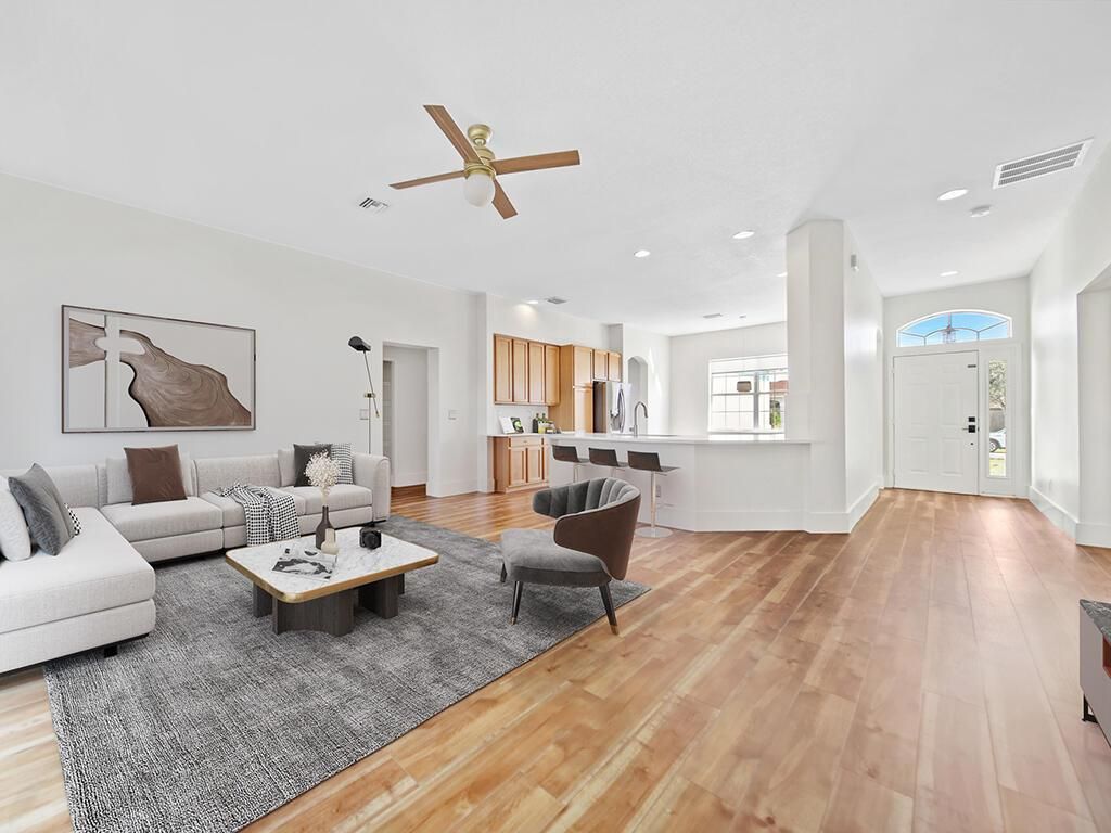 Photo of 3562 SW Vollmer Street, Port Saint Lucie, FL 34953 (MLS # R10940395)