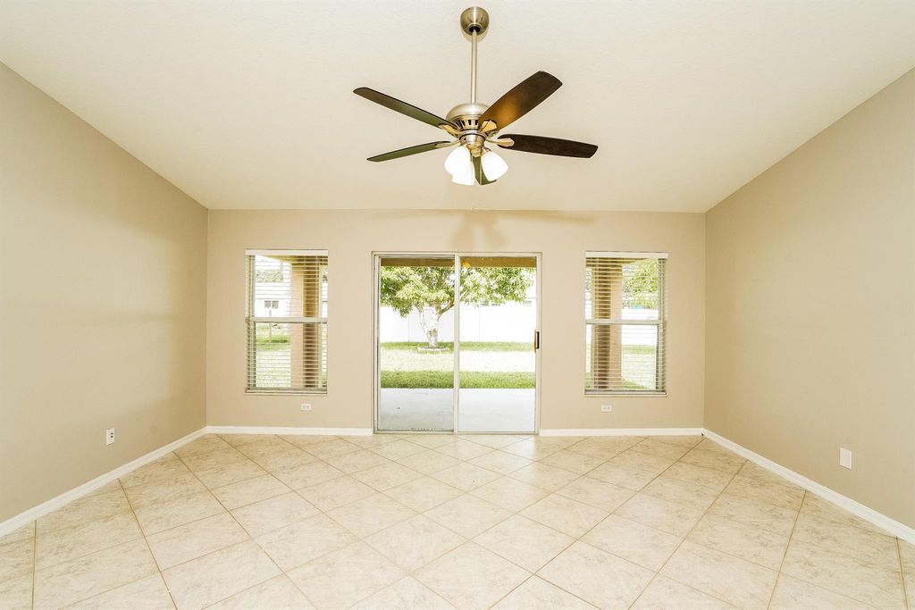 Photo of 549 SE Crosspoint Drive, Port St Lucie, FL 34983 (MLS # R11119413)