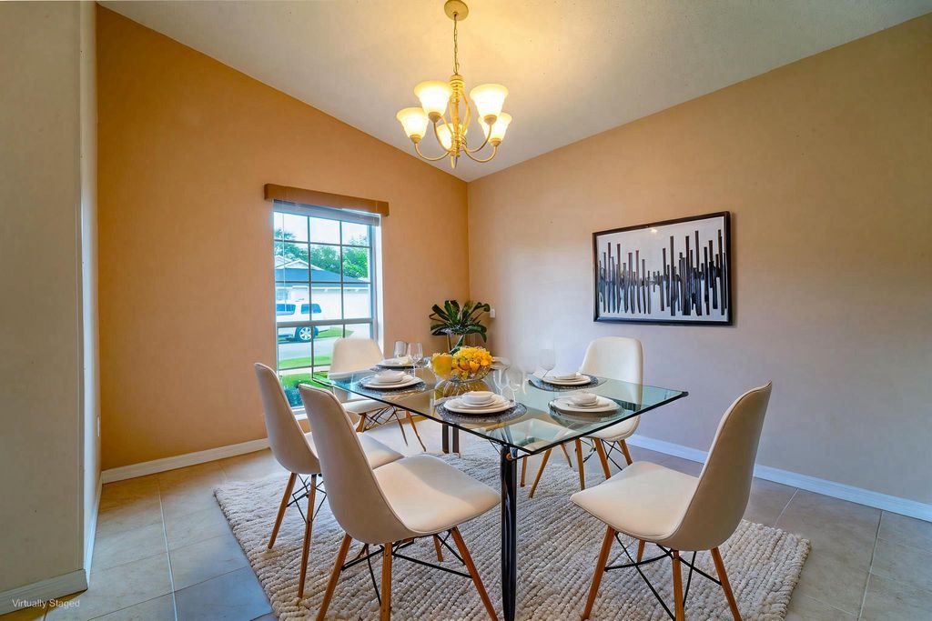 Photo of 313 SW North Shore Boulevard, Port Saint Lucie, FL 34986 (MLS # R11090896)