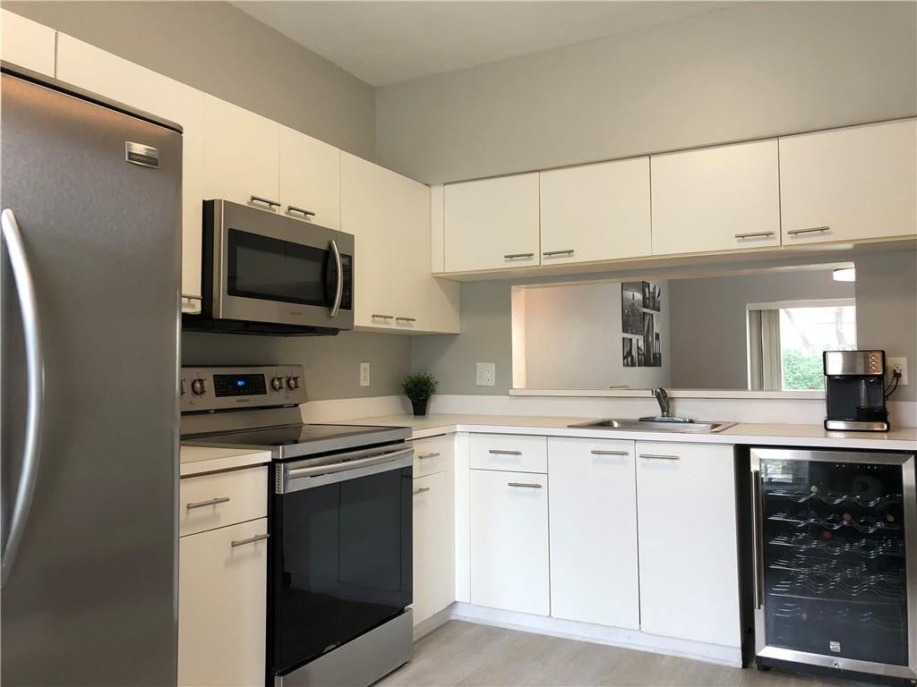 Photo of 9960 NW 57th Manor #9960, Coral Springs, FL 33076 (MLS # F10552656)